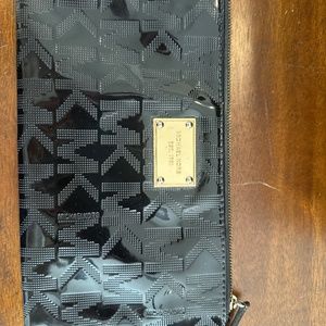 Michael Kors Black and Gold clutch